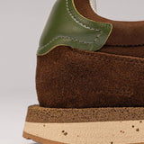 Detalhe traseiro — couro liso verde
